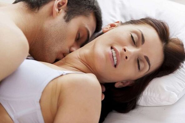 Man and woman excited in bed